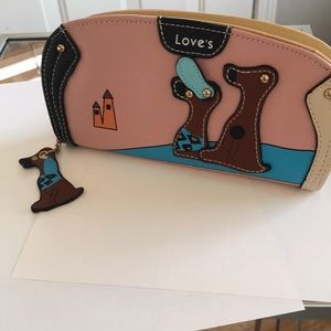 Love’s women’s zippered  dog wallet inner compartments card holder